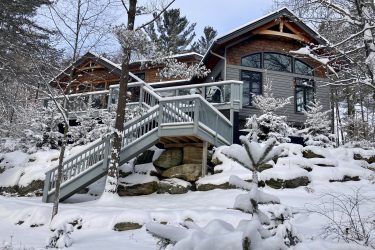 winter wonderland at Muskoka Soul – Cliff Bay, a custom-built luxury post-and-beam waterfront cottage located in Cliff Bay on Lake Muskoka near Gravenhurst, Ontario, Canada
